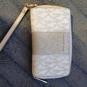 authentic MK Silver and Cream Wristlet